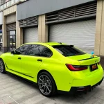 Rear full side shot BMW 3 Series MOZX Gloss Neon Lime glossy TPU paint protection wrap, trunk and taillight detail