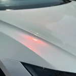 White Iridescent Red PPF Wrap Tesla Hood Detail