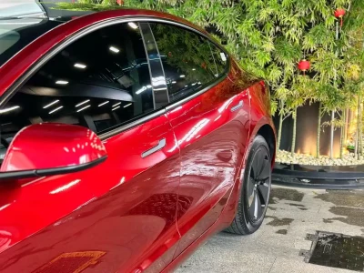 Gloss Liquid Metal Cherry Red PET wrap MOZX Easy Tesla Model 3 side profile