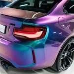 Rear taillight close-up BMW M2 wrapped in Fairy Spirit Blue color shift PPF