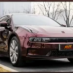 ZEEKR angled front close‑up MOZX Easy metallic rose black PET vinyl wrap