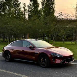 Xiaomi sedan side‑profile shot MOZX Smart metallic rose‑black glossy PET car wrap