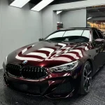 BMW front‑angle shot MOZX Elite metallic rose‑black self‑healing TPU car wrap