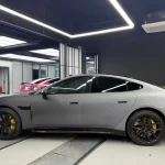 Self‑healing eclipse black gradient TPU car wrap side‑view effect on Xiaomi SU7 Ultra sedan