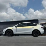 Side profile MOZX Smart white iridescent gold PET car wrap Tesla Model Y