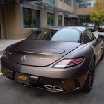 Rear three-quarter shot Mercedes SLS AMG MOZX Easy Dark Copper matte metallic PET wrap, consistent dark copper tone on trunk & rear fender