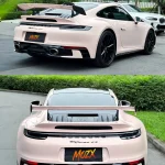 Dual split shot rear & rear three-quarter Porsche 911 Carrera 4S wrapped MOZX Elite Shell Pink self-healing glossy TPU wrap, dream pastel pink sports car film outdoor real shot