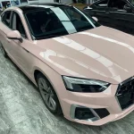 Diagonal front full-body Audi A5 wrapped MOZX Smart Shell Pink glossy PET vinyl wrap, complete side & front panel display