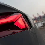 Rear LED taillight macro shot Audi RS5 wrapped MOZX Elite Bernina Grey glossy PET-TPU wrap, smooth reflective composite film surface