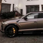 Side wheel arch shot Lamborghini Urus wrapped MOZX Easy Dark Copper matte PET wrap, matte copper film fits wide-body SUV sharp angular panels