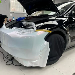 Installing MOZX Elite White Iridescent Red TPU wrap on Tesla Model Y front bumper, white red chameleon film
