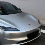 Tesla Model3 front hood close-up with MOZX Smart GT Silver PET Vinyl Wrap